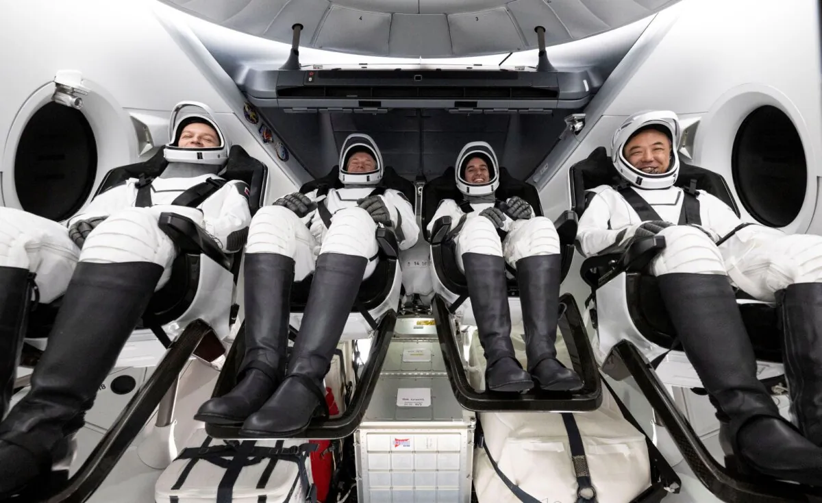 Russia cosmonaut Konstantin Borisov, (L), ESA (European Space Agency) astronaut Andreas Mogensen, NASA astronaut Jasmin Moghbeli, and Japan Aerospace Exploration Agency (JAXA) astronaut Satoshi Furukawa are seen inside the SpaceX Dragon Endurance spacecraft onboard the SpaceX recovery ship MEGAN shortly after having landed in the Gulf of Mexico off the coast of Pensacola, Fla., on March 12, 2024. (Joel Kowsky/NASA via AP)