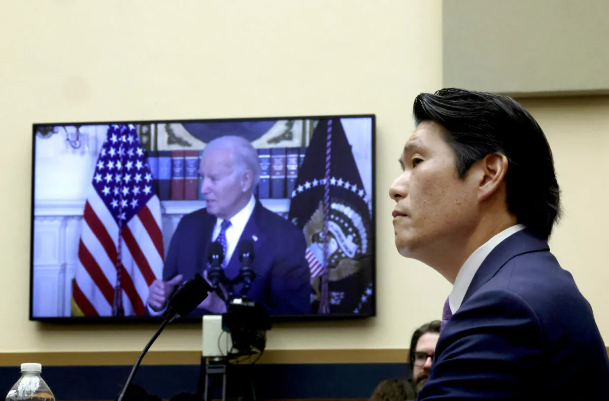 Former Special Counsel Robert K. Hur testifies alongside a video of President Joe Biden before the House Judiciary Committee in Washington on March 12, 2024. (Chip Somodevilla/Getty Images)