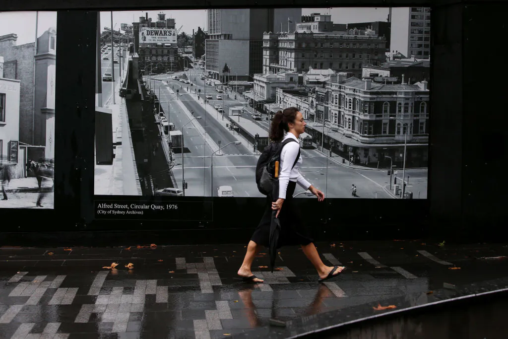 Pedestrians make their way through Circular Quay in Sydney, Australia on Feb. 25, 2022. Lisa Maree Williams/Getty Images)