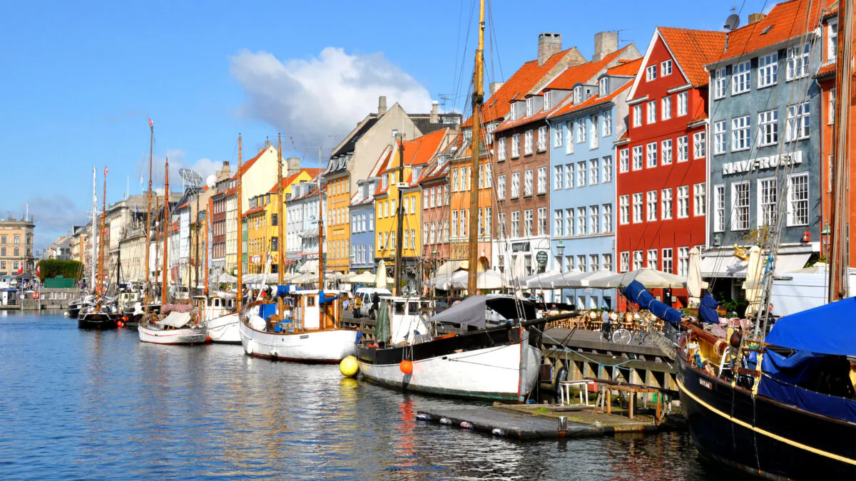 The colorful Nyhavn neighborhood is the place to moor on a sunny day in Copenhagen. (Cameron Hewitt/TNS)