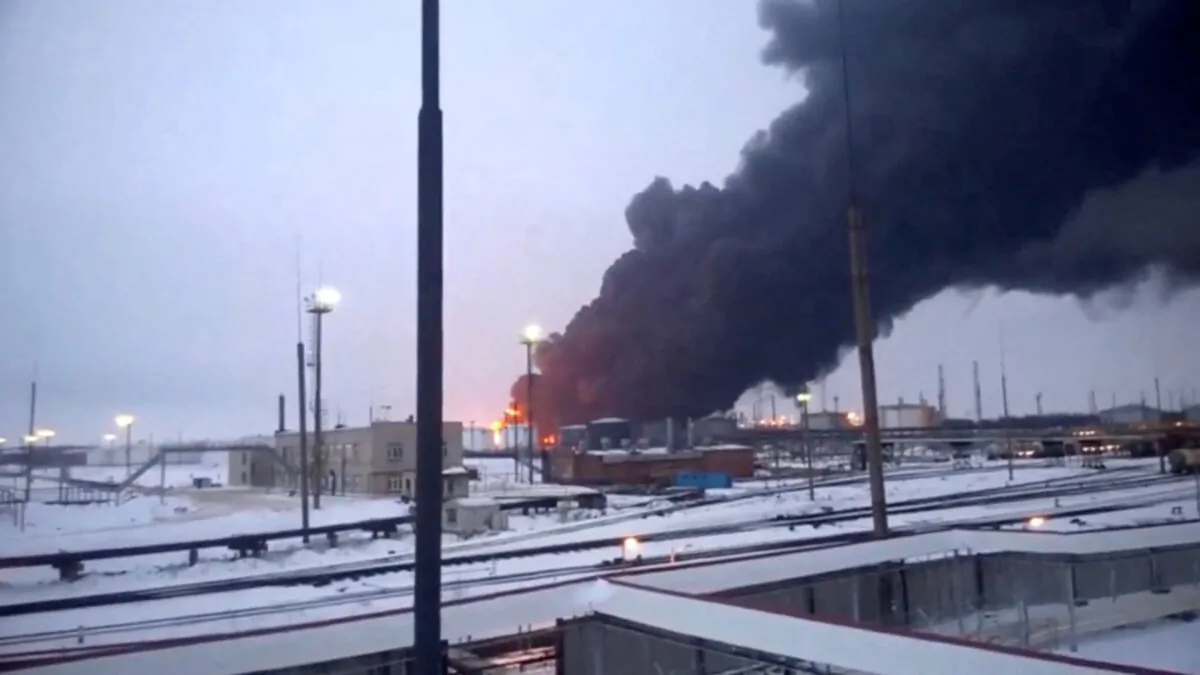 Smoke billows after Ukraine's SBU drone strikes a refinery, in Ryazan, Ryazan Region, Russia, in this screen grab from a video, on March 13, 2024. (Video Obtained By Reuters/via Reuters)