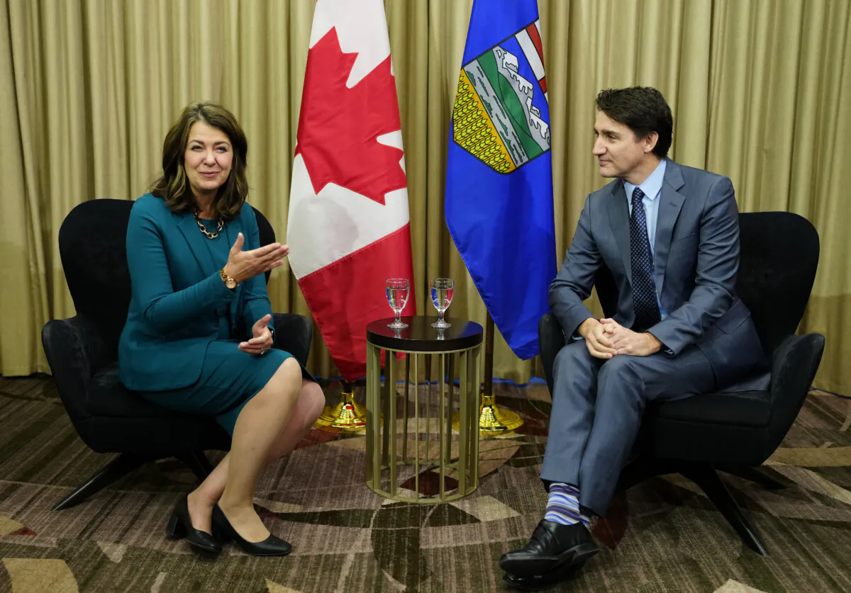 Prime Minister Justin Trudeau meets with Alberta Premier Danielle Smith in Calgary on March 13, 2024. (The Canadian Press/Todd Korol)