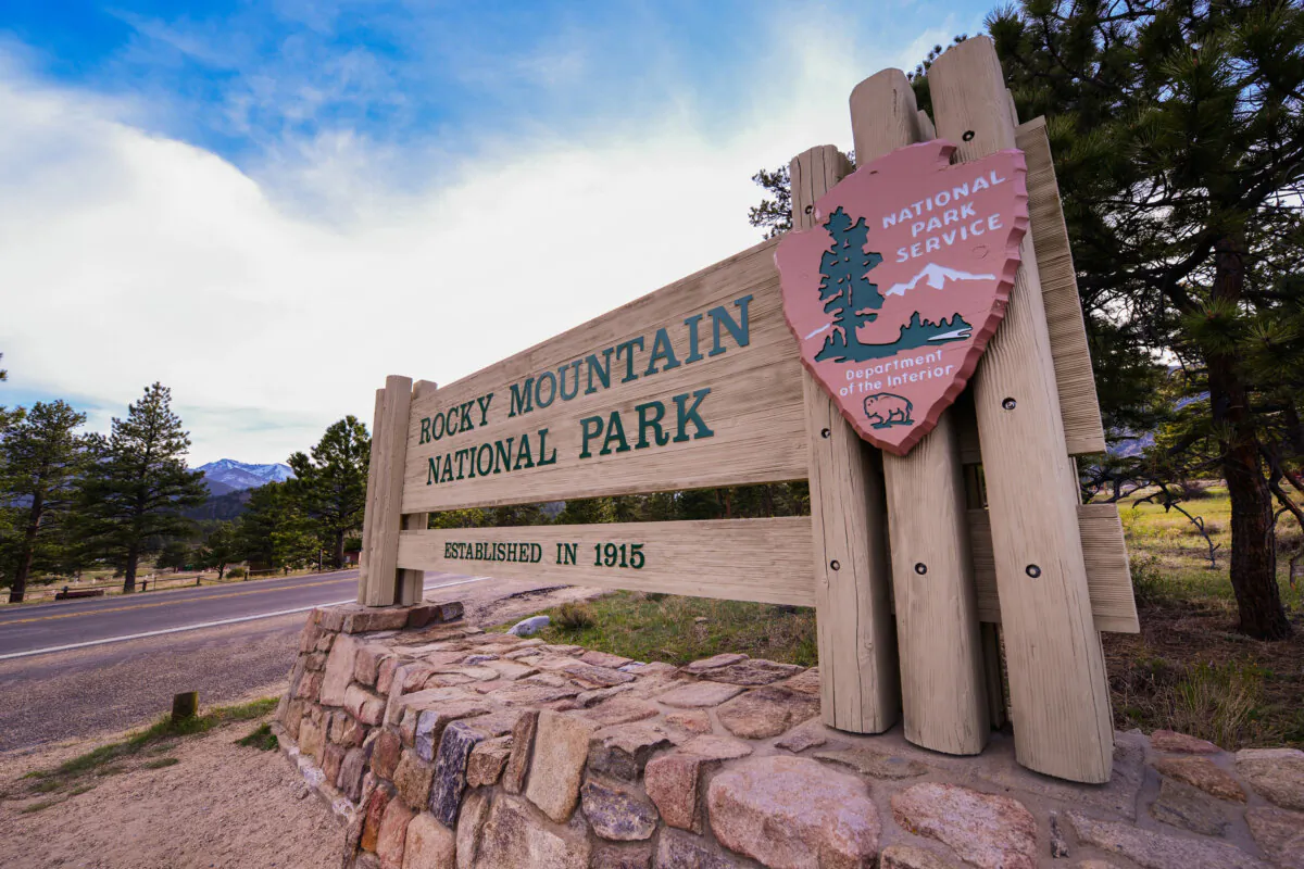 An entrance sign to the Rocky Mountain National Park in Colorado. (Welcomia/Dreamstime/TNS)