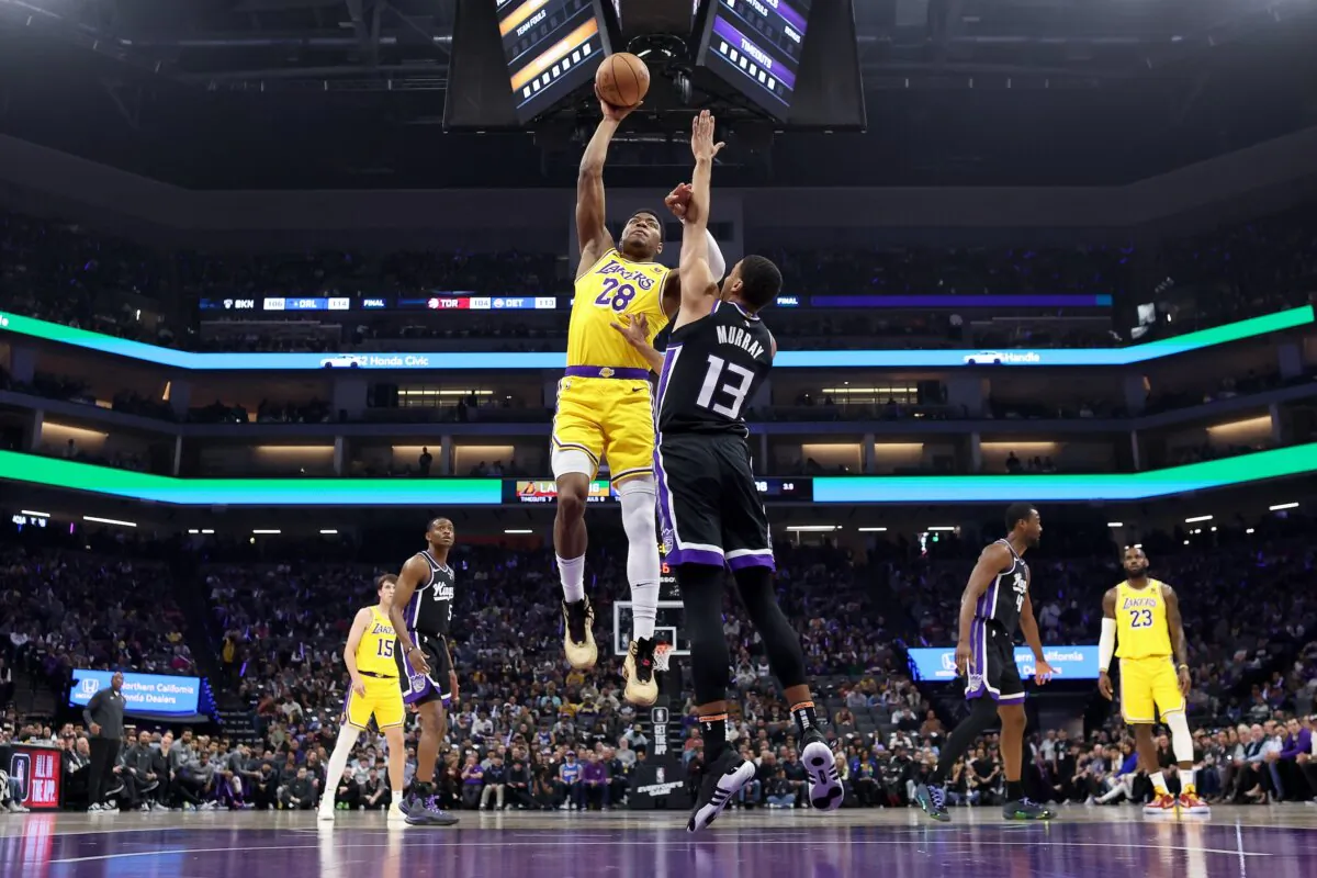 Rui Hachimura (28) of the Los Angeles Lakers goes up for a shot on Keegan Murray (13) of the Sacramento Kings in the first half in Sacramento, Calif., on March 13, 2024. (Ezra Shaw/Getty Images)