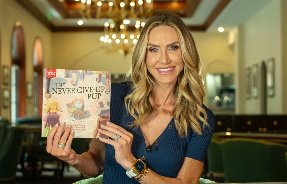 Lara Trump, daughter-in-law of former President Donald Trump, shows off her new children's book, "The Never-Give-Up Pup" in February 2024. (Courtesy of Brave Books via Amplifi Agency)