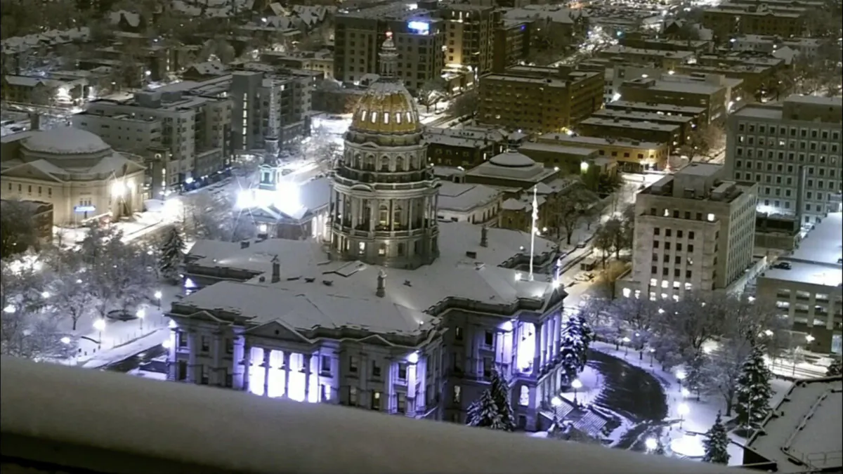The Colorado State Capitol is covered in snow in Denver on March 14, 2024. (KMGH via AP)