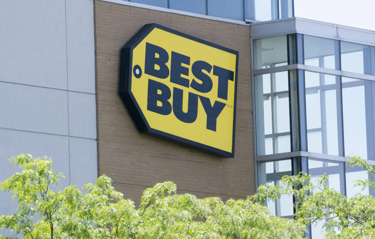 A Best Buy sign is seen on a store front in Montreal on June 18, 2019. (The Canadian Press/Paul Chiasson)