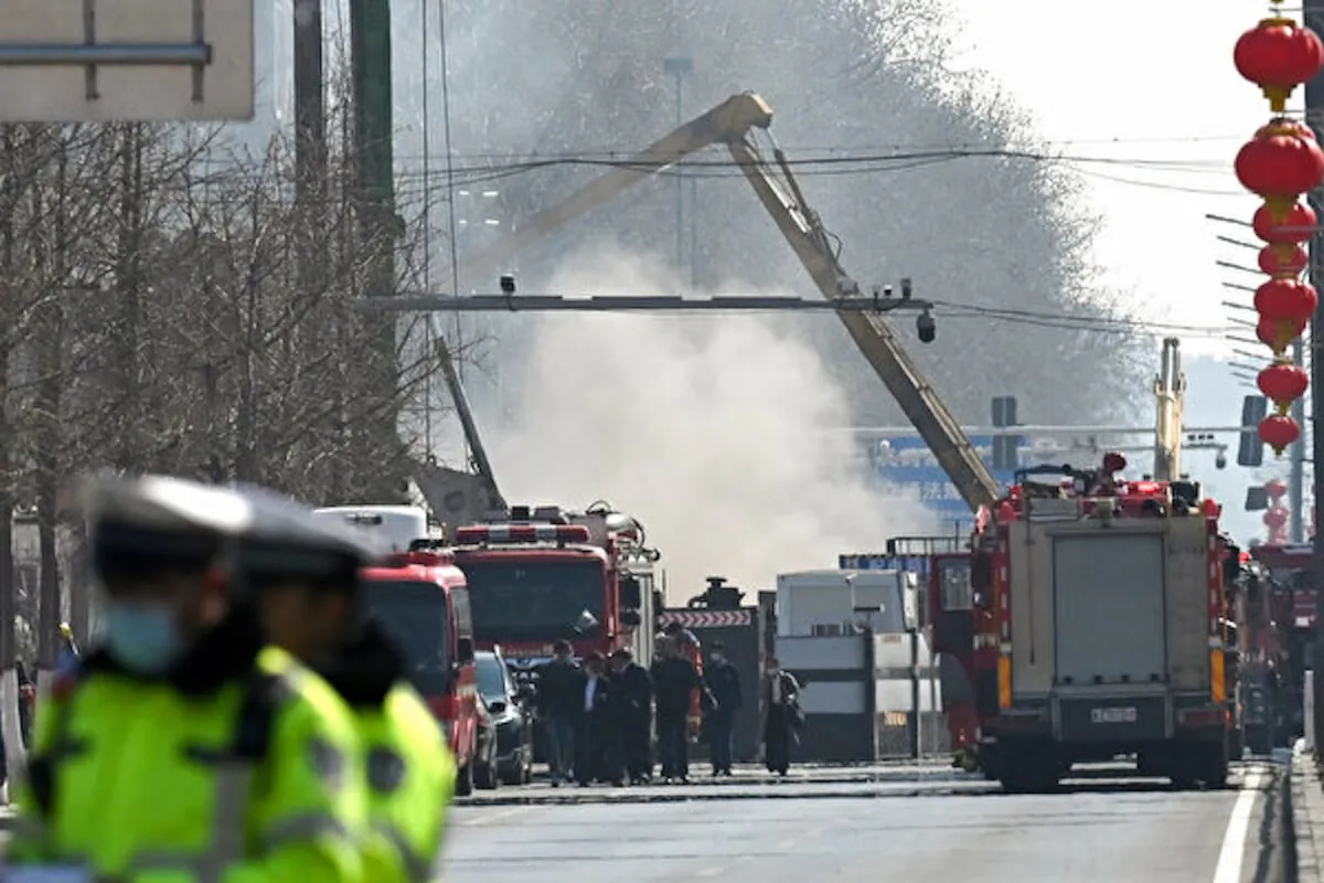 Firefighters work at the scene of a suspected gas explosion in Sanhe, in China’s northern Hebei province on March 13, 2024. (Greg Baker / AFP)