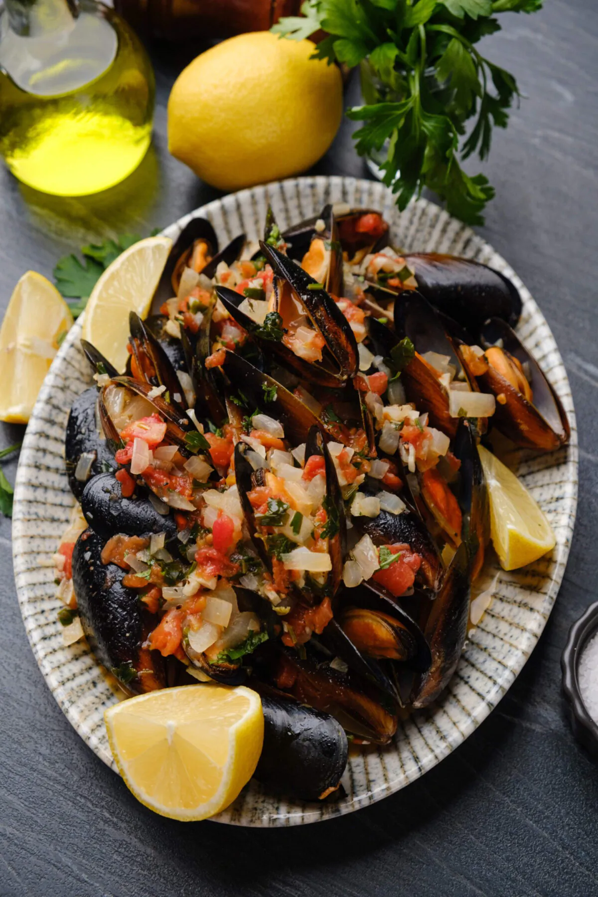 These light, flavorful mussels cooked in a delectable wine sauce are simply irresistible. You’ll want some crusty bread to soak up all the savory sauce. (Courtesy of Amy Dong)