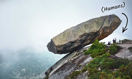 Ginormous 500-Ton 'Hanging Rock' Defies Gravity, Clinging to Cliff in Russia for Over 100,000 Years