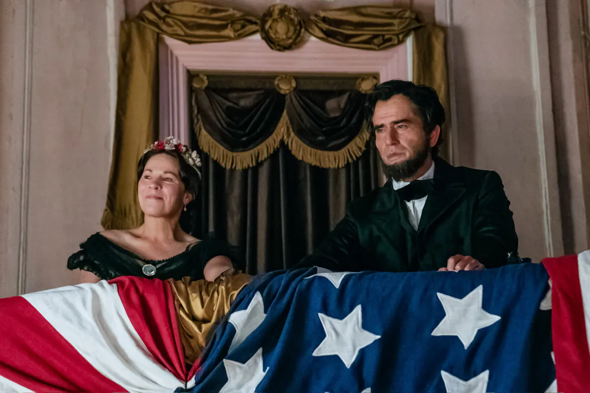 Mrs. Lincoln (Lili Taylor) and President Lincoln (Hamish Linklater) at Ford Theatre, in "Manhunt." (Apple TV+)


