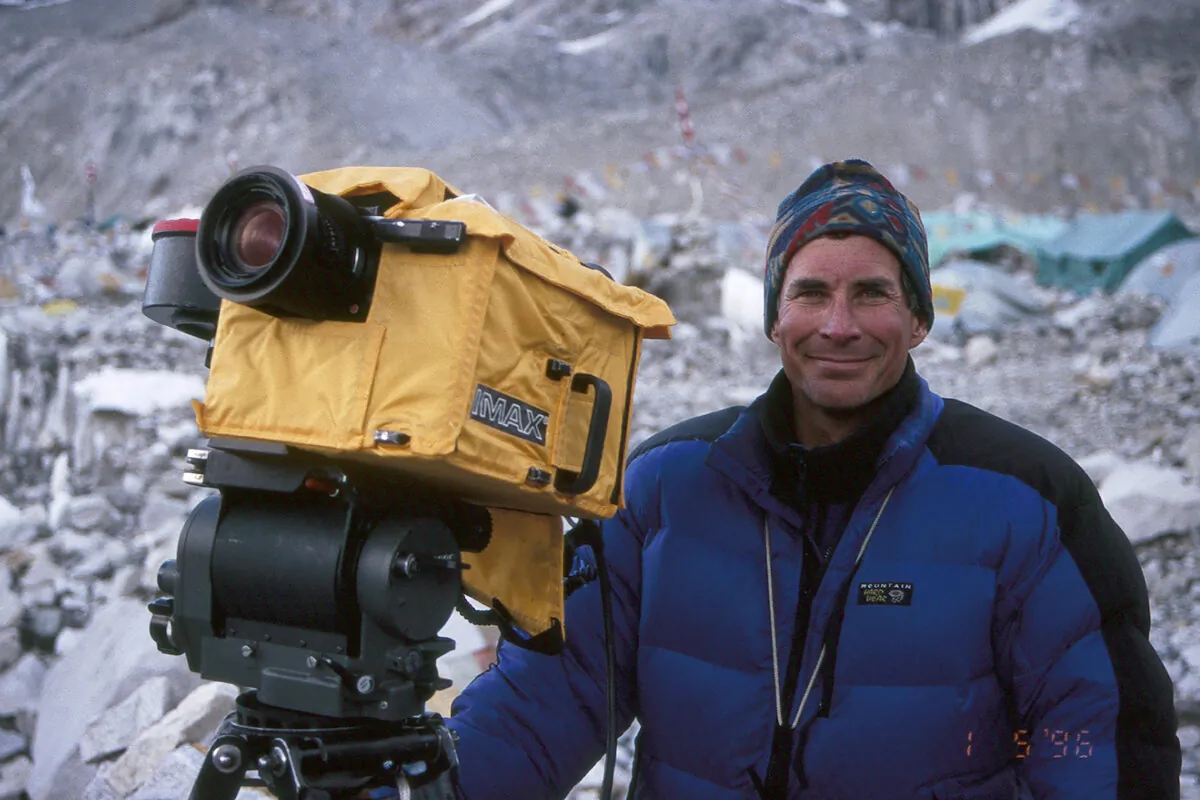 This photo provided by Arcturus Motion Pictures, Inc., shows Mountaineer, filmmaker and author David Breashears while filming the IMAX documentary “Everest” that premiered in 1998. Breashears, 68, died on Thursday, March 14, 2024 at his home in Marblehead, Mass.  (Arcturus Motion Pictures, Inc. via AP)