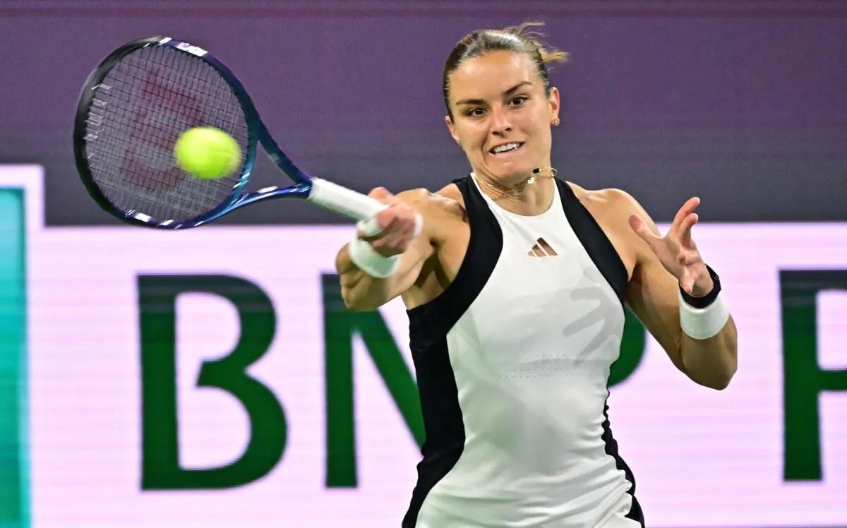 Greece's Maria Sakkari hits a forehand return to USA's Coco Gauff during their ATP-WTA Indian Wells Masters women's semi-final tennis match in Indian Wells, Calif., on March 15, 2024. (Frederic J. BROWN/AFP)