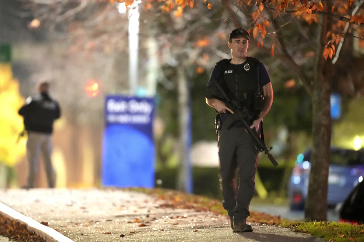 Law enforcement officers outside Central Maine Medical Center during an active shooter situation in Lewiston, Maine, on Oct. 25, 2023. (Steven Senne/AP Photo)