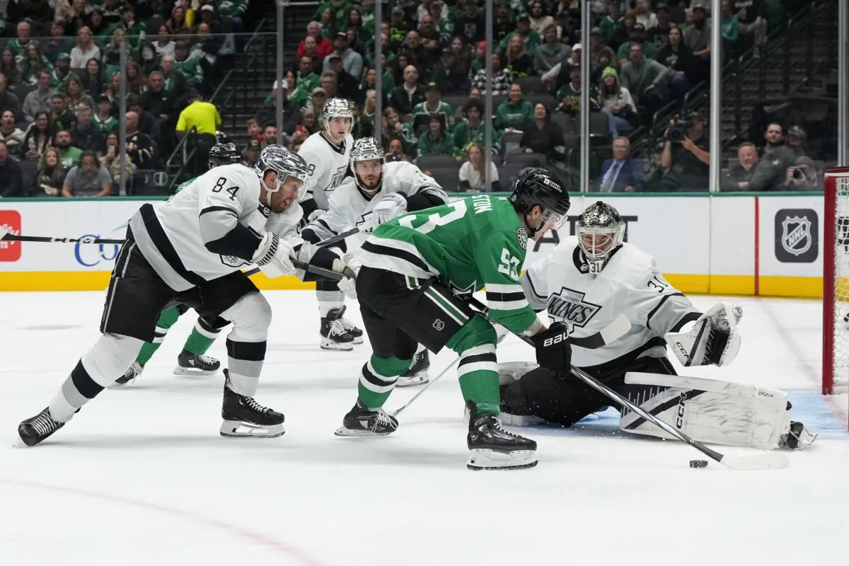 Wyatt Johnston (53) of the Dallas Stars is defended by Vladislav Gavrikov (84) of the Los Angeles Kings during the first period in Dallas on March 16, 2024. (Sam Hodde/Getty Images)