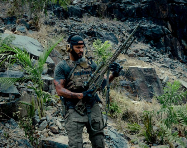 man with sniper rifle in LAND OF BAD
