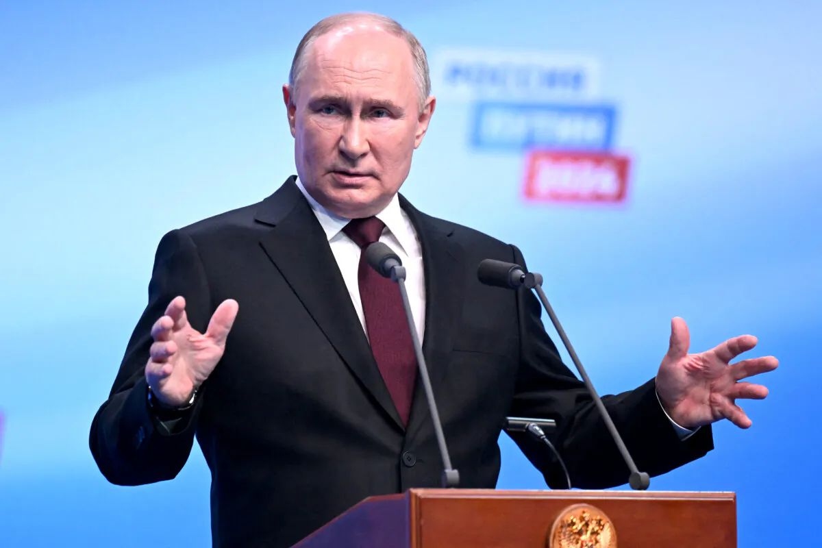 Russian President Vladimir Putin meets with the media at his presidential campaign headquarters in Moscow on March 18, 2024. (Natalia Kolesnikova/Pool/AFP via Getty Images)