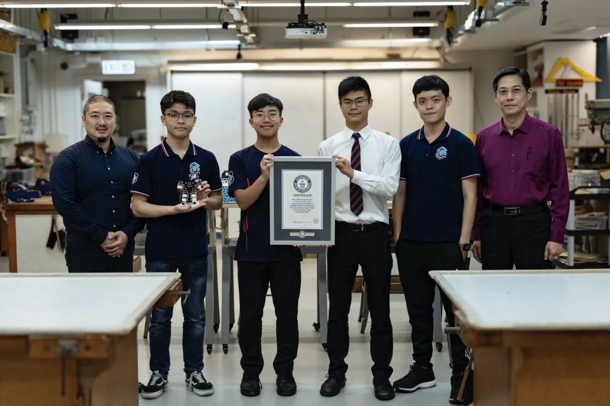 Four secondary school students from Diocesan Boys' School earlier built a humanoid robot that is only 141 mm (5.5 inch) tall, the world's smallest of such devices, and gained the Guinness World Records certification in January this year. (Courtesy of DBS Robotics)