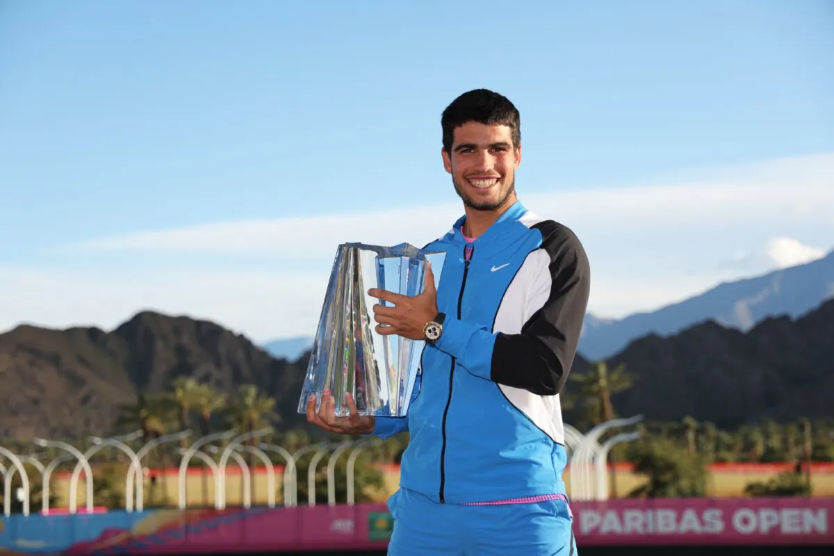 Carlos Alcaraz of Spain holds his winners trophy at the media photocall after his straight sets victory against Daniil Medvedev in the Men's Final during the BNP Paribas Open in Indian Wells, Calif., on March 17, 2024. (Clive Brunskill/Getty Images)