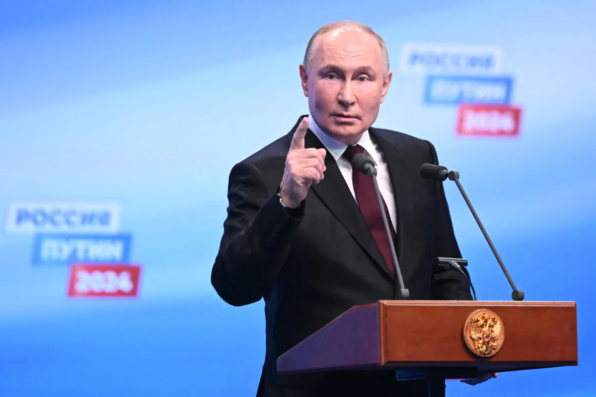 Russian President and presidential candidate Vladimir Putin meets with the media at his campaign headquarters in Moscow on March 18, 2024. (Natalia Kolesnikova/Pool/AFP via Getty Images)