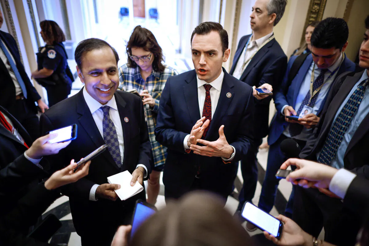 Rep. Raja Krishnamoorthi (D-Ill.) (L) and Rep. Mike Gallager (R-Wis.) talk with reporters after the House voted on legislation they co-sponsored that could ban TikTok at the U.S. Capitol in Washington on March 13, 2024. (Chip Somodevilla/Getty Images)