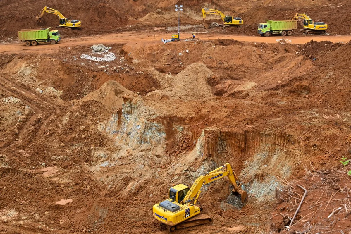 Workers using excavators during an exploration for nickel ore by Gema Kreasi Perdana (GKP) on Wawonii island in southeast Sulawesi, on Feb. 28, 2023. (Adek Berry/AFP via Getty Images)