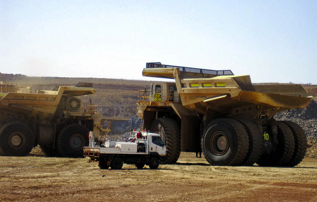 The world's largest dump trucks shifting earth at Citic Pacific Mining's Sino Iron magnetite iron ore project in the Pilbara region of Western Australia on Mar. 5, 2010. (Amy Coopes/AFP via Getty Images)
