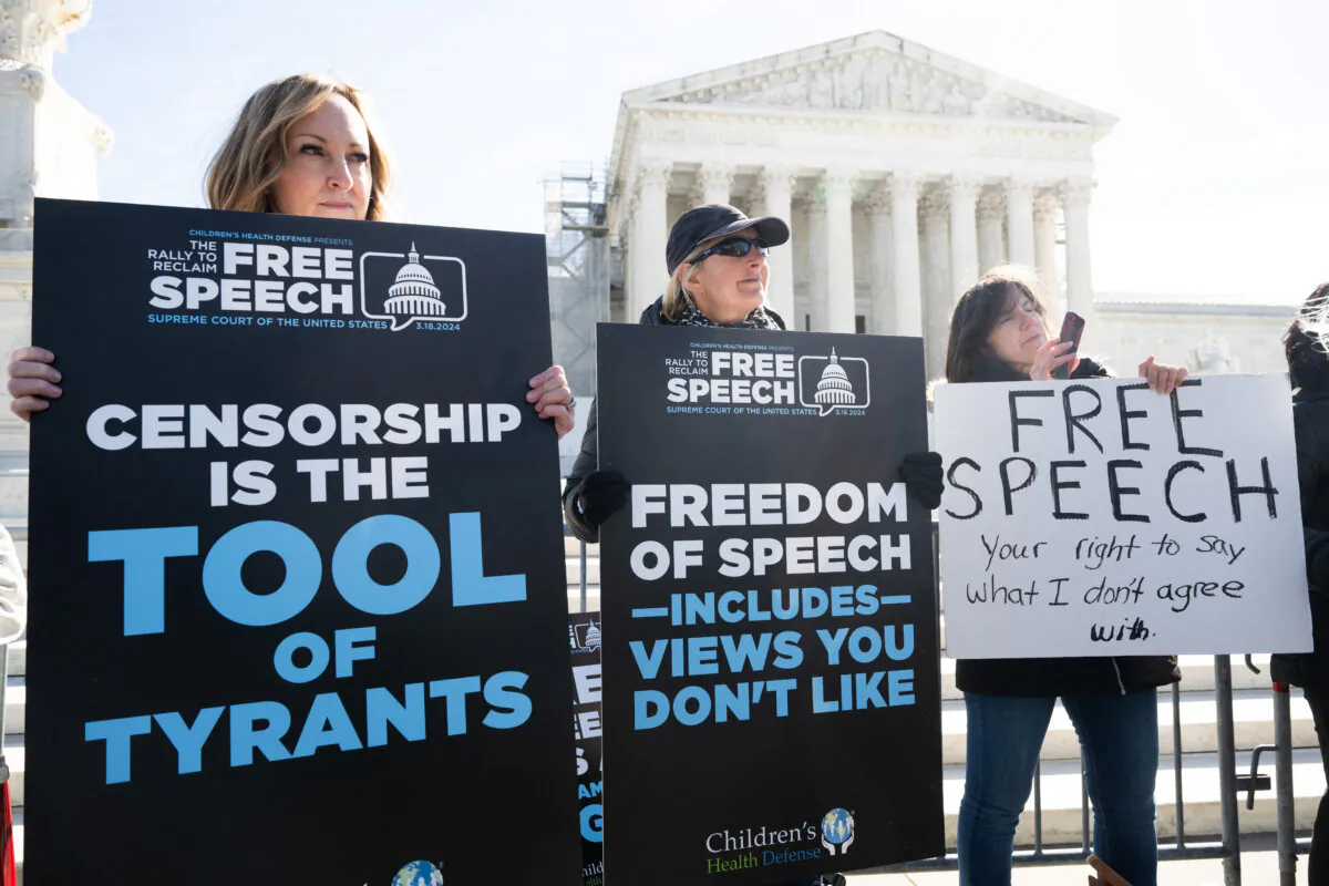 Free speech activists demonstrate outside the Supreme Court in Washington on March 18, 2024. (Saul Loeb/AFP via Getty Images)