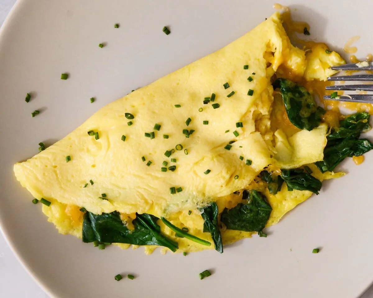 You can make a perfect diner-style omelet at home with whatever fillings you like. (Ryan Liebe/TNS)