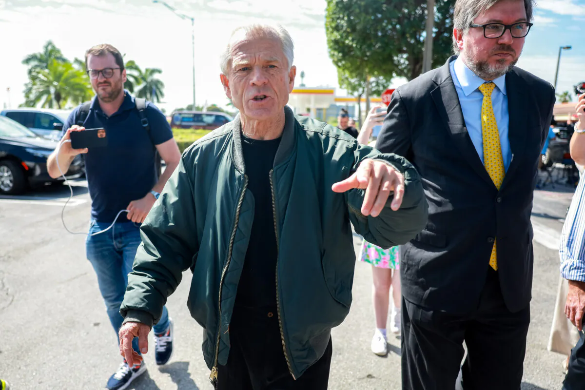 Former Trump adviser Peter Navarro walks away after holding a press conference before turning himself in to a federal prison in Miami, Fla., on March 19, 2024. (Joe Raedle/Getty Images)