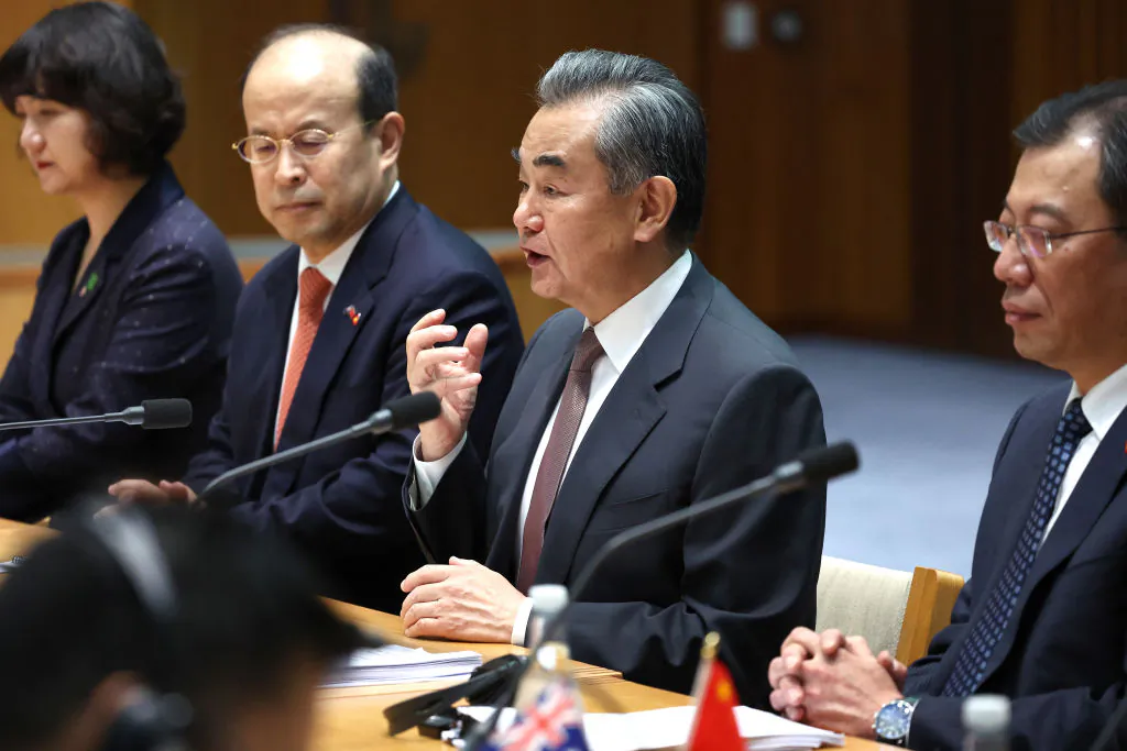 Chinese Communist Party (CCP) Foreign Minister Wang Yi (C) holds talks with Australian Foreign Minister Penny Wong at a bilateral meeting in Canberra, Australia, on March 20, 2024. (David Gray/AFP via Getty Images)