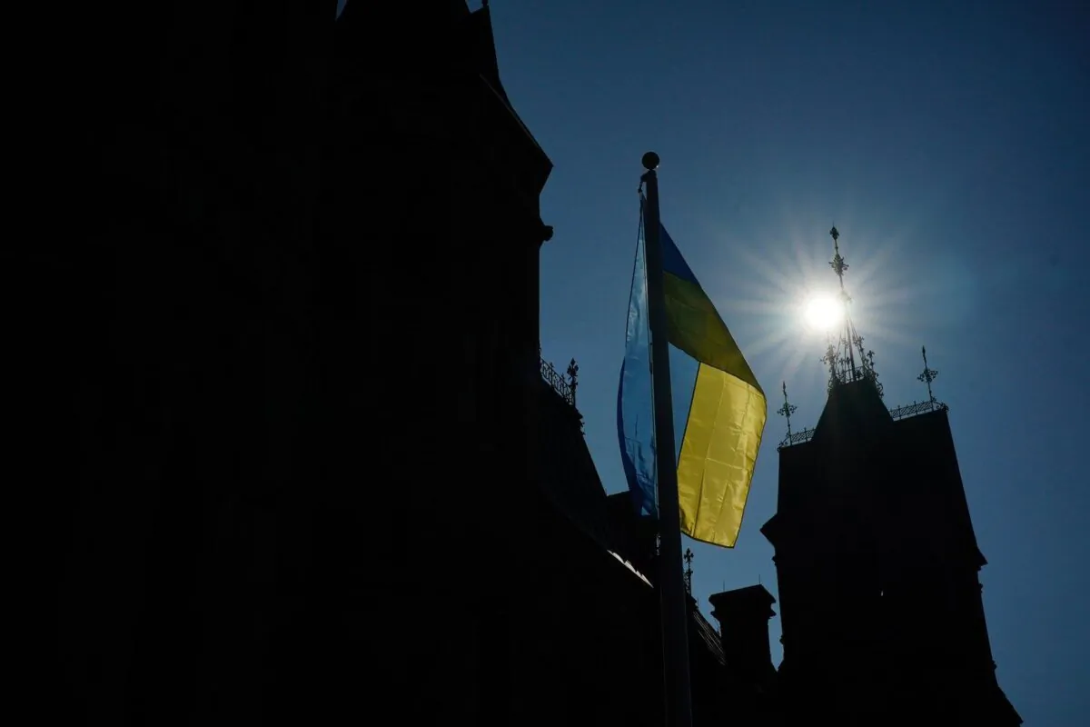 The Ukrainian flag is raised outside West Block on Parliament Hill as Ukrainian President Volodymyr Zelenskyy visits Ottawa on Sept. 22, 2023. (The Canadian Press/Sean Kilpatrick)

