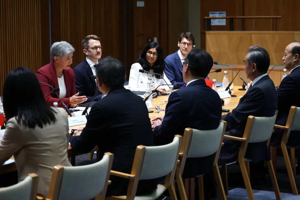 Australian Foreign Minister Penny Wong (L) holds talks with Chinese Foreign Minister Wang Yi (2nd R) at a bilateral meeting in Canberra on March 20, 2024. Chinese Foreign Minister Wang Yi is visiting Australia to hold talks on bilateral and international issues with Australian officials. (David Gray/AFP via Getty Images)