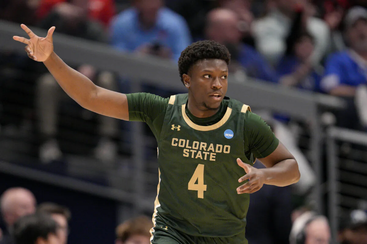 Colorado State's Isaiah Stevens reacts after making a 3-point basket against Virginia in an NCAA Tournament game in Dayton, Ohio, on March 19, 2024. (Jeff Dean/AP Photo)