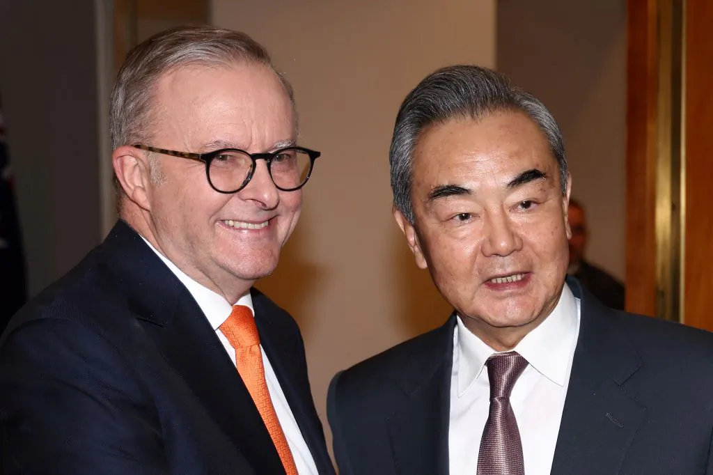 Australian Prime Minister Anthony Albanese (L) receives Chinese Communist Party (CCP) Foreign Minister Wang Yi for a meeting in Canberra, Australia on March 20, 2024. (David Gray/AFP via Getty Images)