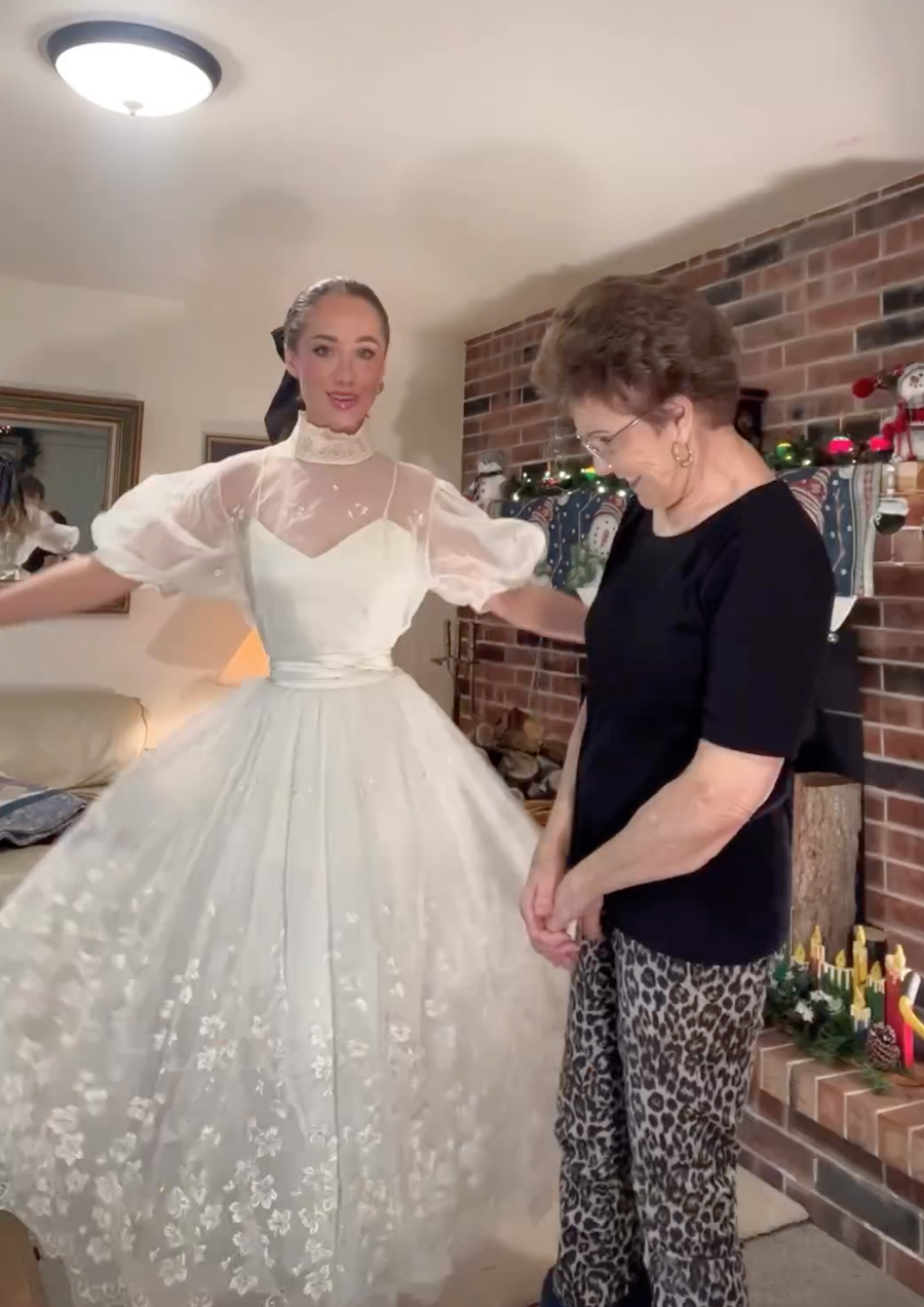 Ms. Jan in a white outfit from her grandmother.