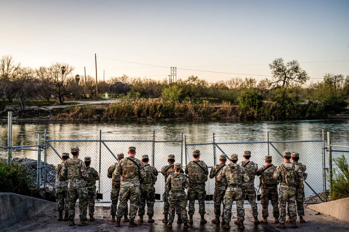 National Guard soldiers stand guard on the banks of the Rio Grande river at Shelby Park in Eagle Pass, Texas, on Jan. 12, 2024. (Brandon Bell/Getty Images)