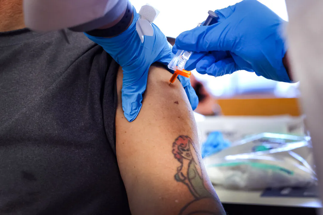 A person receives an influenza vaccine in Chicago, Ill., in a file photograph. (Scott Olson/Getty Images)