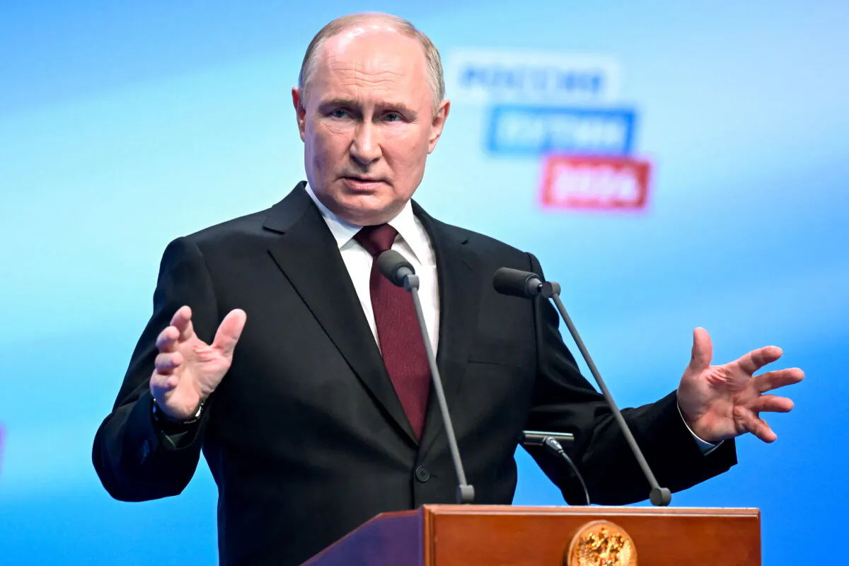 Russian President and presidential candidate Vladimir Putin meets with the media at his campaign headquarters in Moscow on March 18, 2024. (Natalia Kolesnikova/Pool/AFP via Getty Images