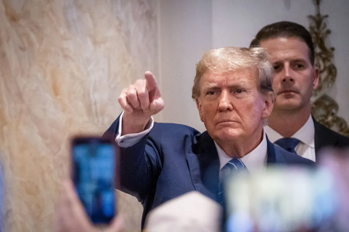 Republican presidential candidate former President Donald J. Trump greets his supporters after speaking on Super Tuesday at Mar-a-Lago Club in Palm Beach, Fla., on March 5, 2024.(Madalina Vasiliu/The Epoch Times)