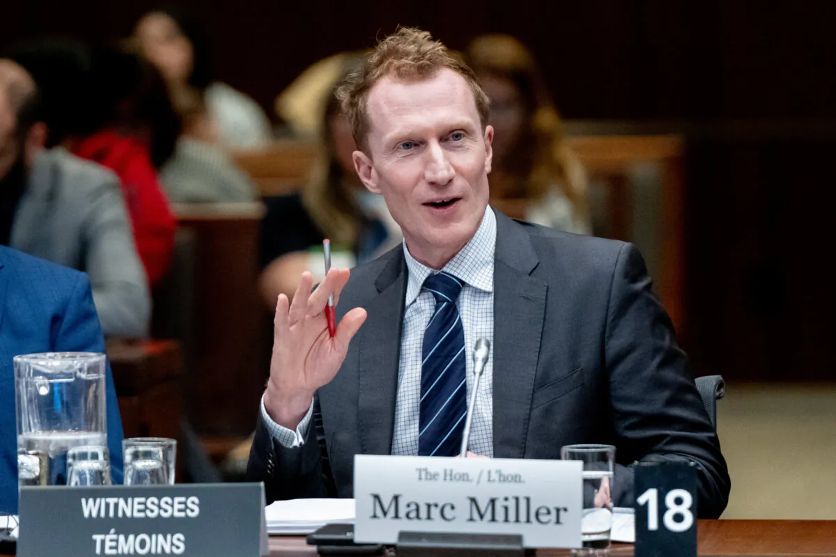 Marc Miller, Minister of Immigration, Refugees and Citizenship, waits to appear before the Standing Committee on Citizenship and Immigration related to a briefing on temporary immigration measures in response to ongoing conflicts in Sudan and Gaza in the Parliamentary Precinct in Ottawa, on March 20, 2024. (The Canadian Press/Spencer Colby)