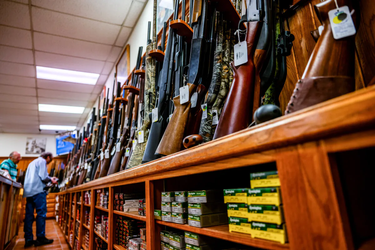 Customers shop for firearms in a gun store in Austin, Texas, on Aug. 25, 2023. (Brandon Bell/Getty Images)