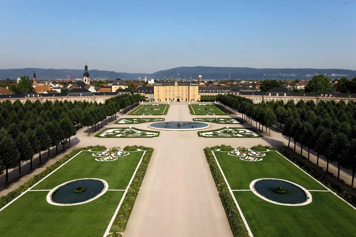 In this aerial view, Schwetzingen Palace is surrounded by a French-style Baroque garden, characterized by flower borders, hedge zones, and water features, reminiscent of Versailles. (Courtesy of the State Palaces and Gardens of Baden-Württemberg/Achim Mende)