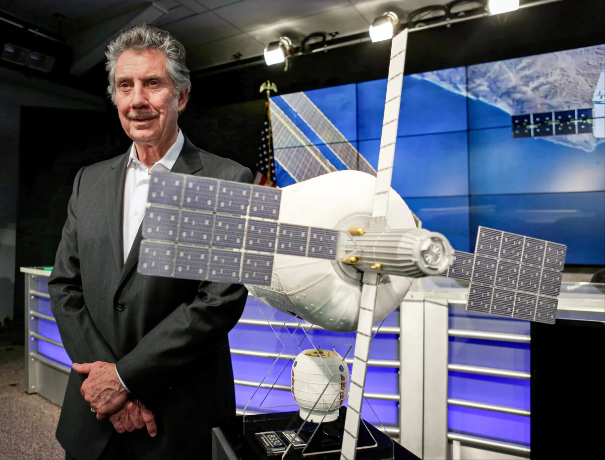 Robert Bigelow, founder and president of Bigelow Aerospace, stands next to a model of an inflatable habitat at the Kennedy Space Center in Cape Canaveral, Fla., on April 7, 2016. (John Raoux/AP)