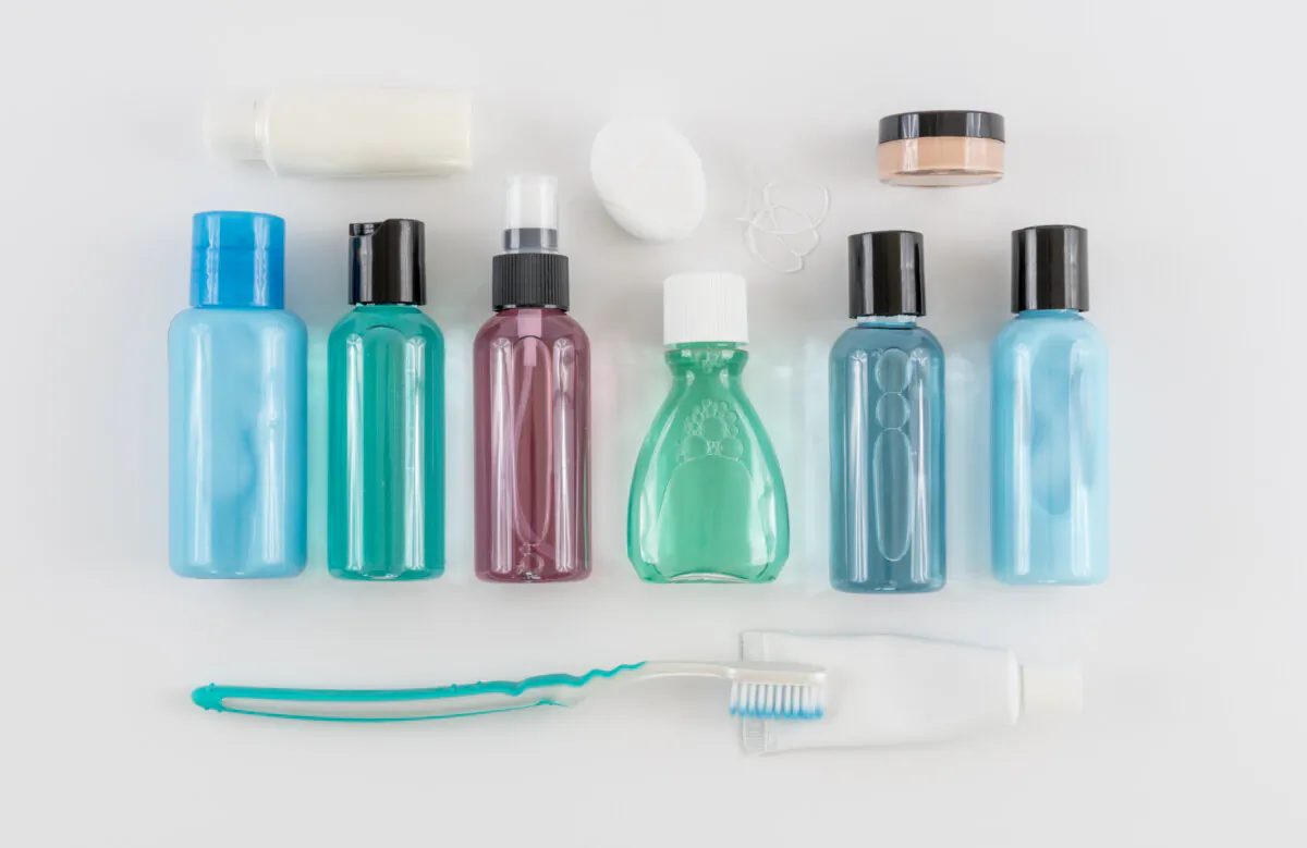 When perfecting your personal care packing, keep all your options on the travel table. (Kris Black/Shutterstock)