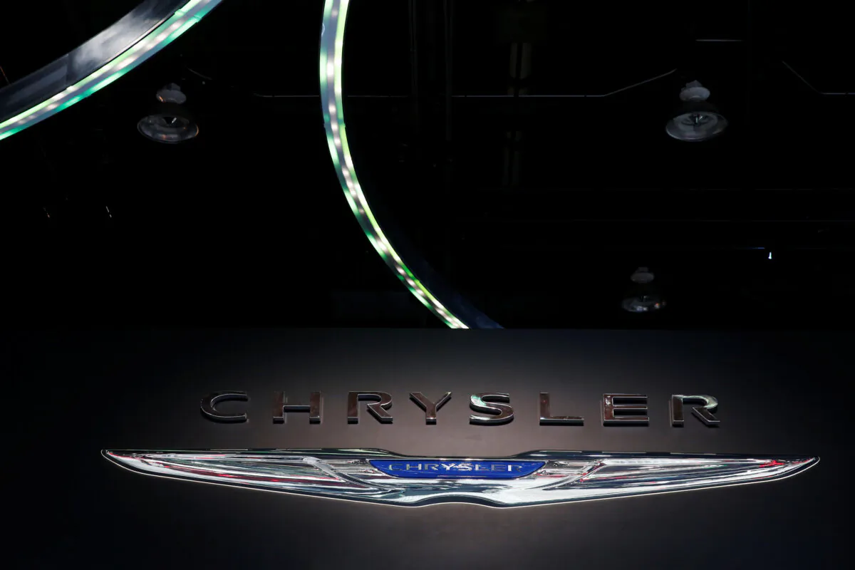 The Chrysler booth displays the company logo at the North American International Auto Show in Detroit on Jan. 16, 2018. (Jonathan Ernst/Reuters)