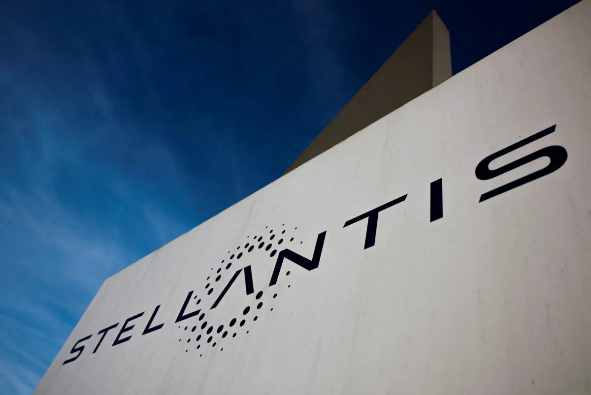 The logo of Stellantis is seen on the company's building in Velizy-Villacoublay near Paris on March 19, 2024. (Gonzalo Fuentes/Reuters)