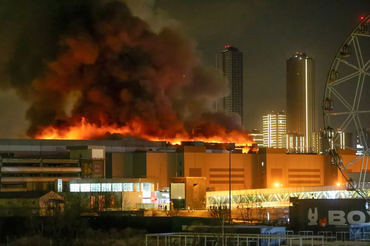 A massive blaze over the Crocus City Hall on the western edge of Moscow on March 22, 2024. (Sergei Vedyashkin/Moscow News Agency via AP)