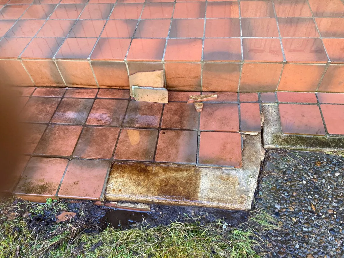 Freezing water under the tile caused the tile to lift off the concrete. The tile setter made at least one mistake. (Tim Carter/Tribune Content Agency/TNS)