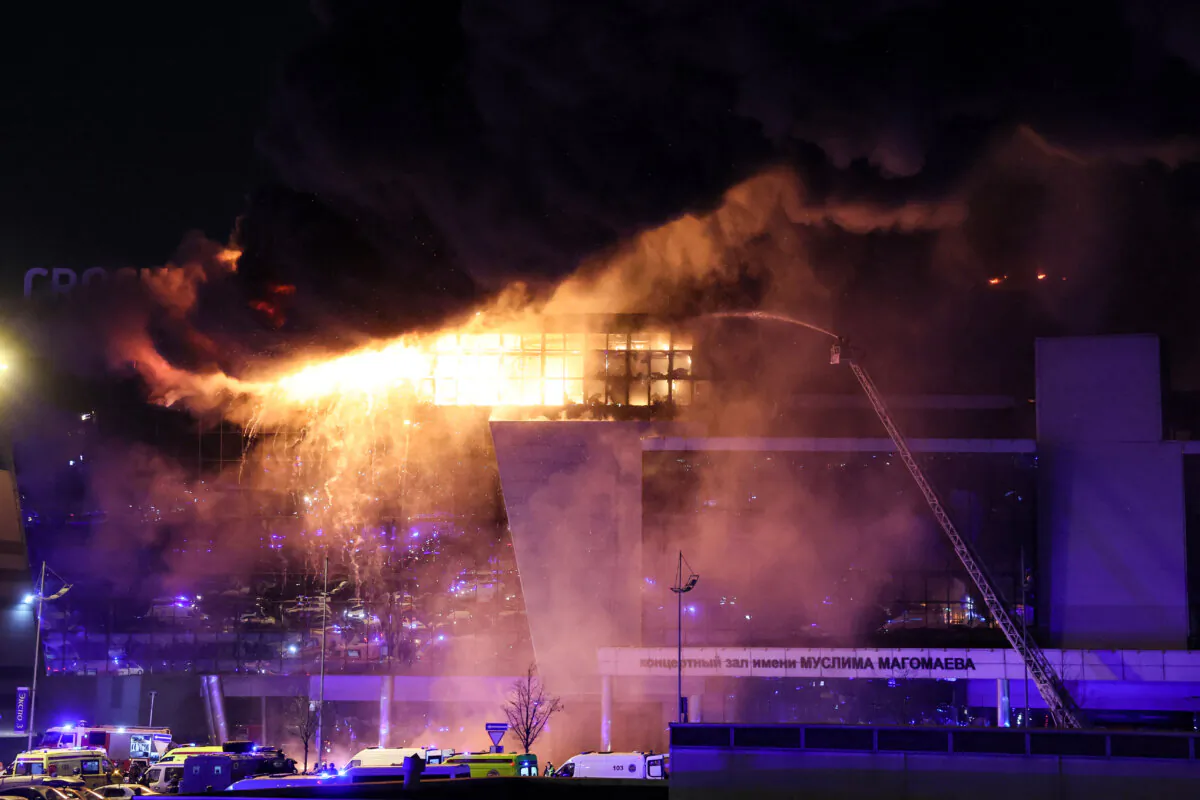 The burning Crocus City Hall concert hall following the shooting incident in Krasnogorsk, outside Moscow, on March 22, 2024. (Stringer/AFP via Getty Images)
